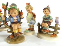 7 HUMMEL FIGURINES