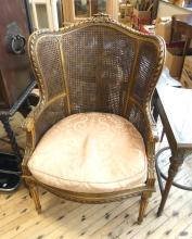 ANTIQUE CANED FRENCH ARMCHAIR