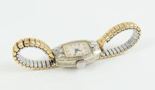 LADIES' GOLD & DIAMOND WRISTWATCH