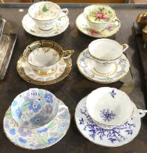 SIX ENGLISH BONE CHINA CUPS AND SAUCERS