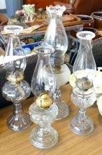 FOUR ANTIQUE GLASS OIL LAMPS
