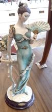 LIMITED EDITION FIGURINE AND WOOD CARVING