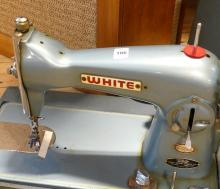 WHITE PORTABLE SEWING MACHINE