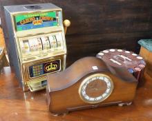 SLOT MACHINE, POKER CHIPS AND CLOCK