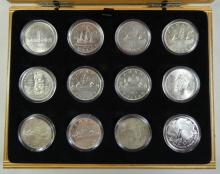 12 CANADIAN SILVER DOLLARS