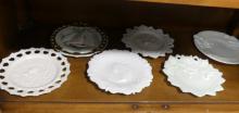 TWELVE FIGURAL MILK GLASS PLATES