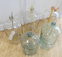 FIVE GLASS CARBOYS