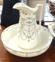 TWO WASH PITCHER AND BASIN SETS