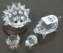 FOUR SWAROVSKI CRYSTAL FIGURINES