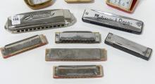 HARMONICAS AND TRAVEL CLOCKS