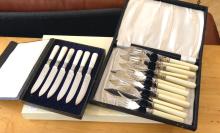 THREE CASES OF CUTLERY