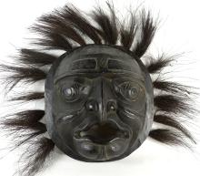 HAND-CARVED BLACK WOOD MASK