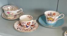 EIGHT ENGLISH CUPS AND SAUCERS