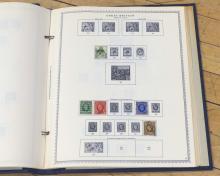 BRITISH STAMPS AND LOON FIGURINE