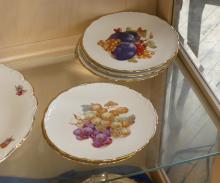 TWO SETS OF DESSERT PLATES