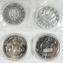 4 CANADIAN SILVER $1 COINS