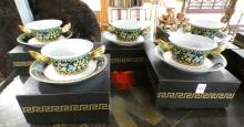 EIGHT VERSACE BOUILLON CUPS WITH SAUCERS