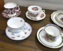 NINE CUPS AND SAUCERS