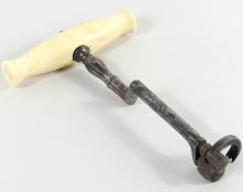 IVORY HANDLED TOOTH KEY