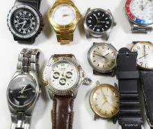 24 WRISTWATCHES