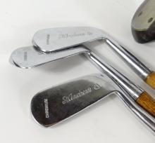 FOUR WOODEN SHAFT GOLF CLUBS