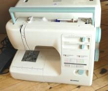 PORTABLE KENMORE SEWING MACHINE