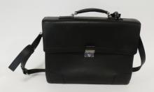 THREE PURSES AND BRIEFCASE