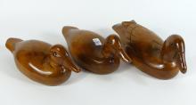 THREE CARVED DUCK DECOYS