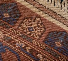OLDER PERSIAN RUG