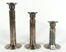 THREE BIRKS CANDLESTICKS