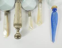 7 MAGNIFYING GLASSES