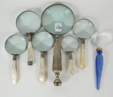 7 MAGNIFYING GLASSES
