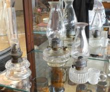 SEVEN GLASS OIL LAMPS