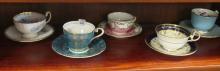 TWELVE AYNSLEY CUPS AND SAUCERS