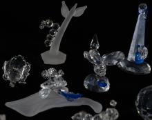 TWENTY-FIVE CRYSTAL FIGURINES