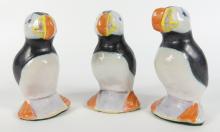 THREE PUFFIN FIGURINES