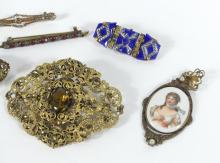 BROOCHES