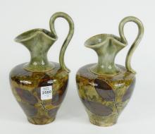 PAIR RARE DOULTON EWERS