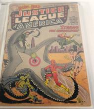 BINDER OF JUSTICE LEAGUE COMIC BOOKS