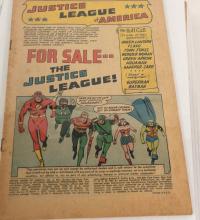 BINDER OF JUSTICE LEAGUE COMIC BOOKS