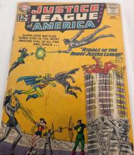 BINDER OF JUSTICE LEAGUE COMIC BOOKS