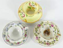 THREE AYNSLEY CUPS AND SAUCERS