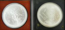 2 SILVER OLYMPIC COINS