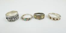 4 STERLING SILVER RINGS