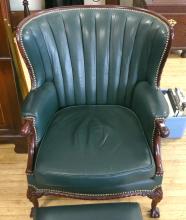 GREEN LEATHER LIBRARY CHAIR AND FOOTSTOOL