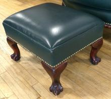 GREEN LEATHER LIBRARY CHAIR AND FOOTSTOOL