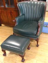 GREEN LEATHER LIBRARY CHAIR AND FOOTSTOOL