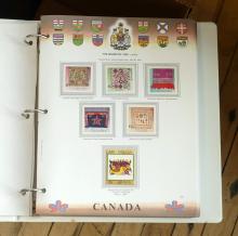 SEVEN BINDERS OF WORLD STAMPS