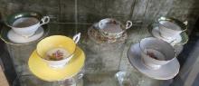 TEN ENGLISH CUPS AND SAUCERS