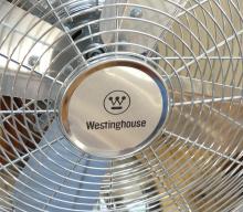 TWO STAINLESS STEEL FANS